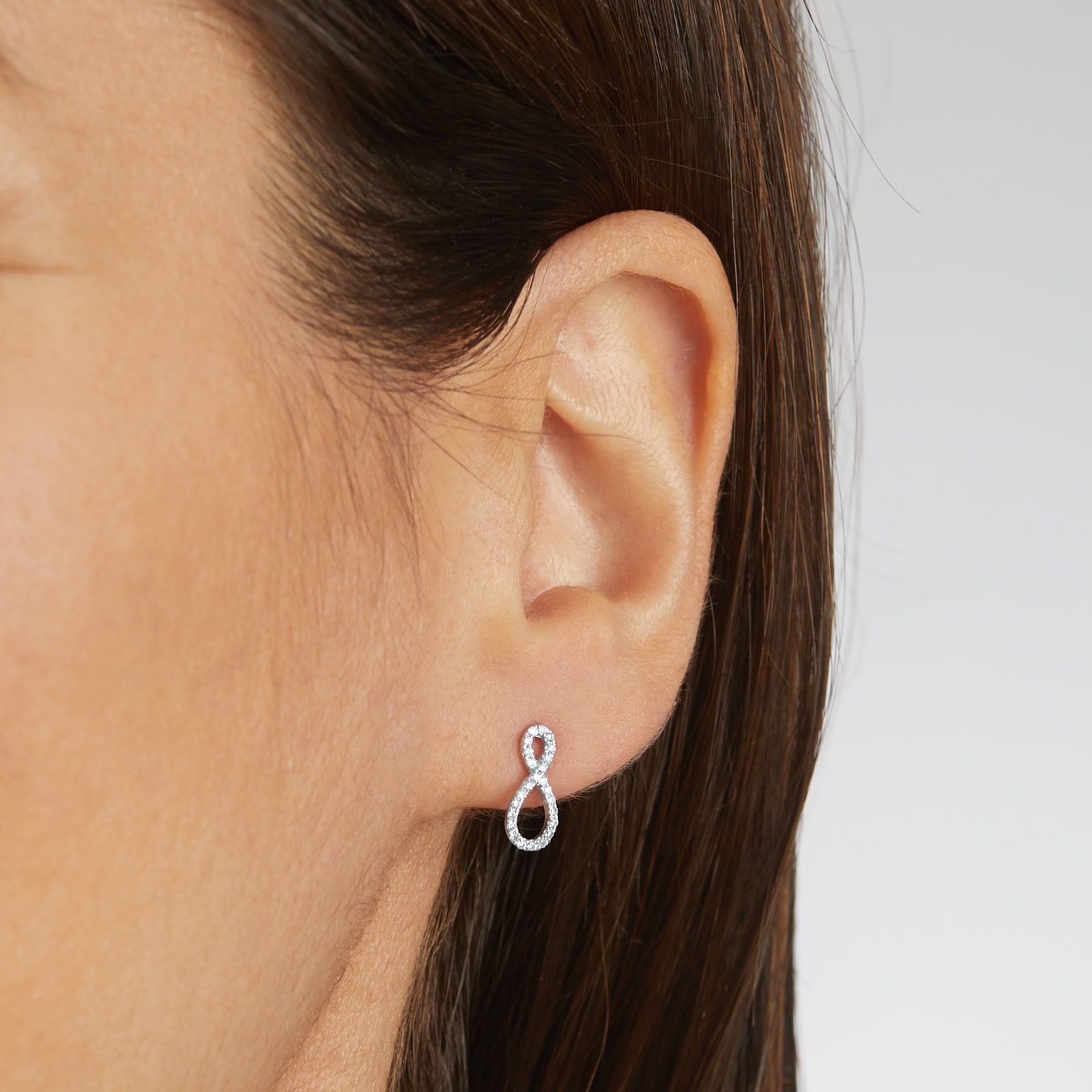 Goldsmiths 9ct White Gold 0.20cttw Diamond Infinity Stud Earrings Goldsmiths 9ct White Gold 0.20cttw Diamond Infinity Stud Earrings